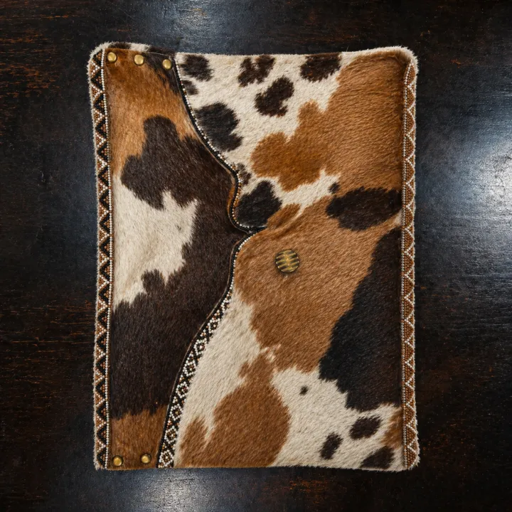Imvula — classic Nguni cow-pattern hide in brown, white and black
